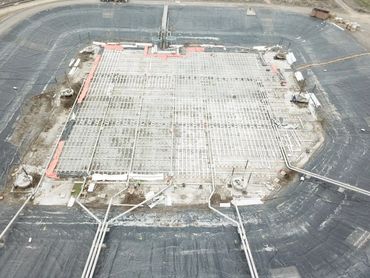 SBR basin from above: aeration piping, ballast block rows, perimeter forms