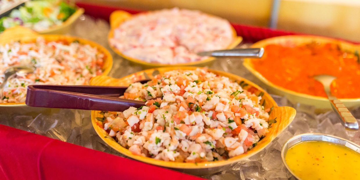 Food On Plate With Serving Spoon