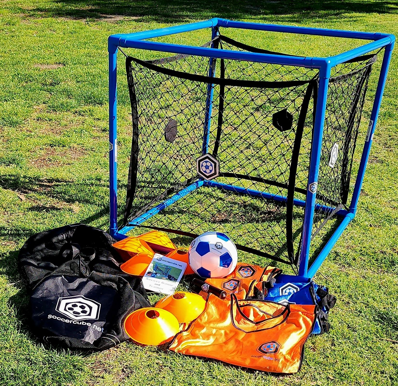 The full SoccerCube package.
1. Four sided goal.
2. Soccer ball.
3. 6 practice jerseys.
4. 6 cones.