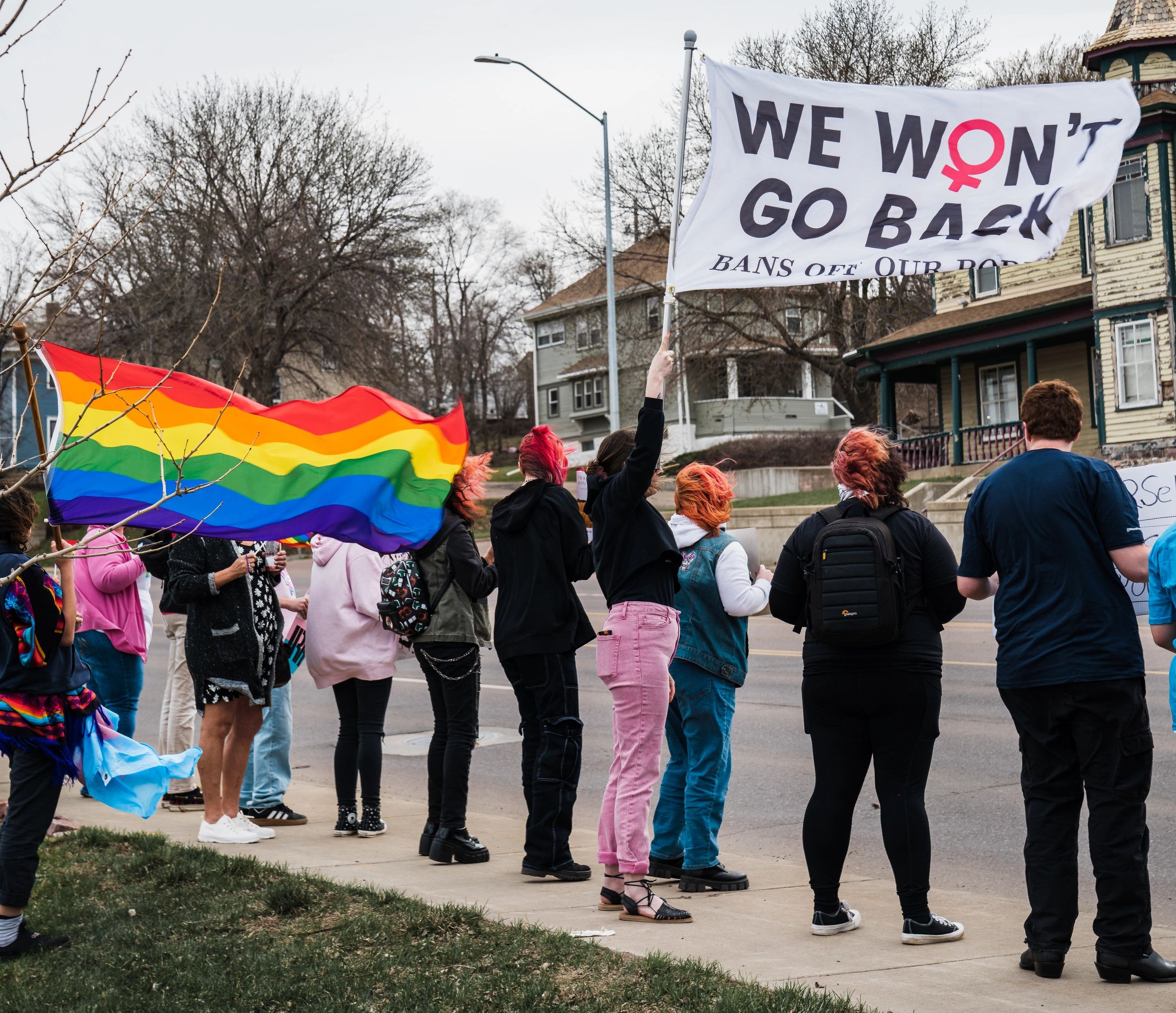 Protest with pro-choice and gay flag in Sioux Falls South Dakota; young people advocating