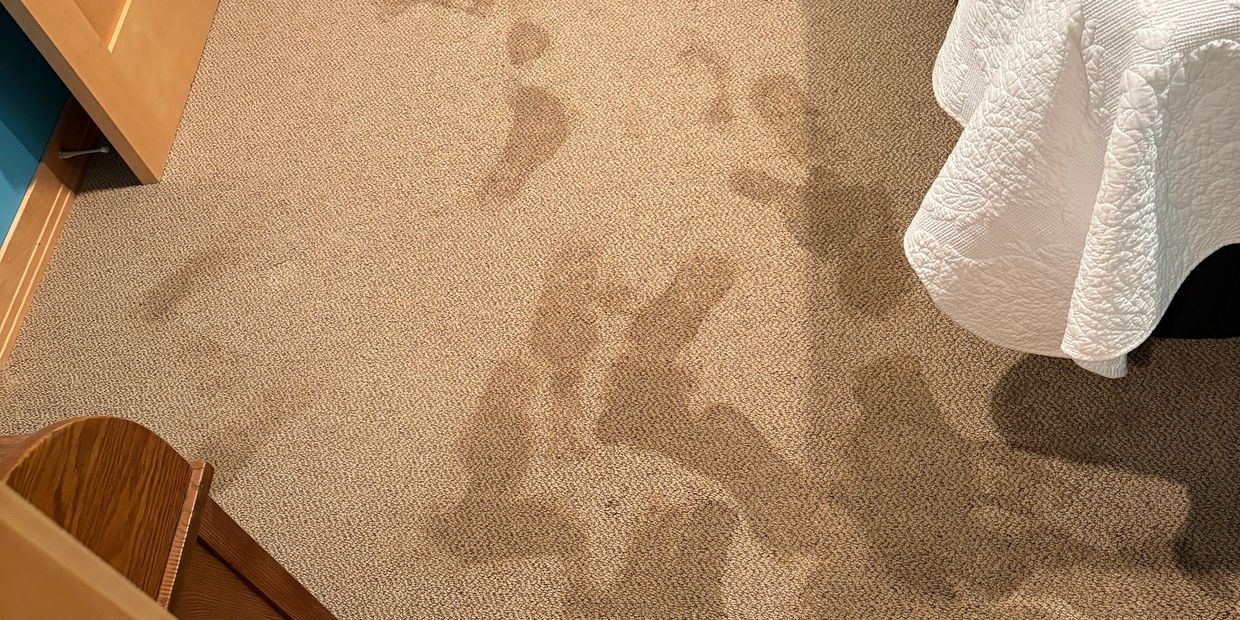 Water-damaged floor during emergency water damage cleanup by Louie's in southeast South Dakota