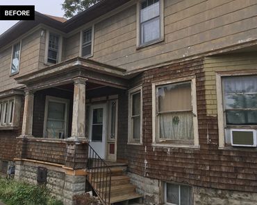 home exterior in need of new paint and trim