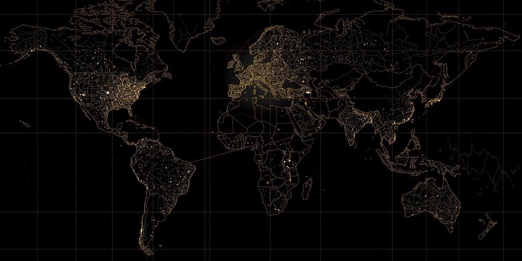 Global map showing illuminated urban areas and transportation routes at night.