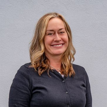 Smiling woman, eyes focused on what lies ahead