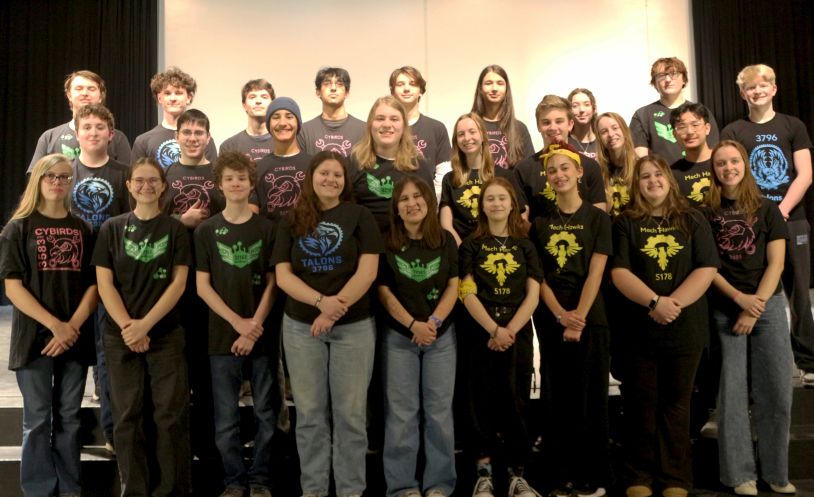 Group photo of diverse youth wearing team shirts