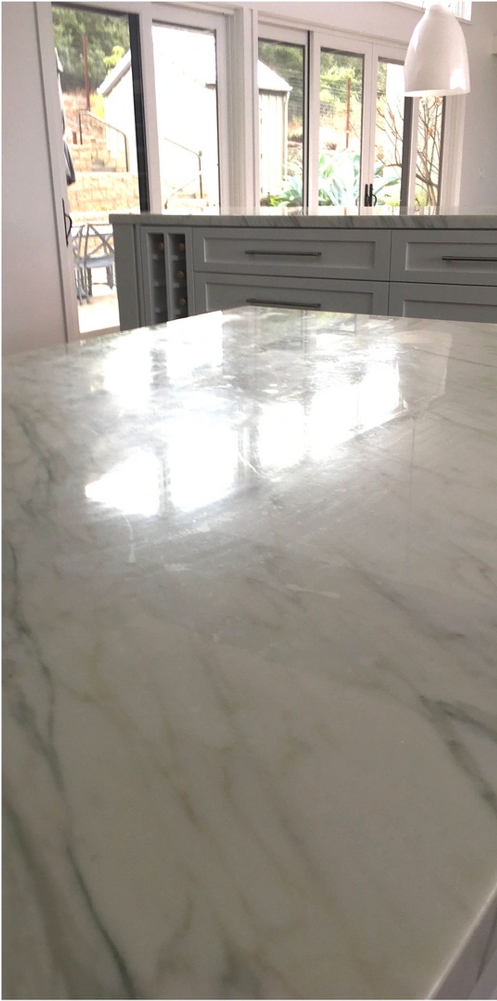 Marble counter top with scratches and etch marks