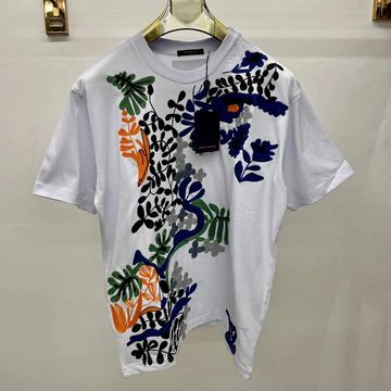 White T-shirt with colorful abstract botanical prints in blue, orange, green, and black.