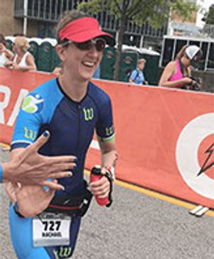 Marathon runner man pushing through race in city