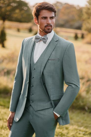grey/green 3 piece tux, matching bow tie with white shite