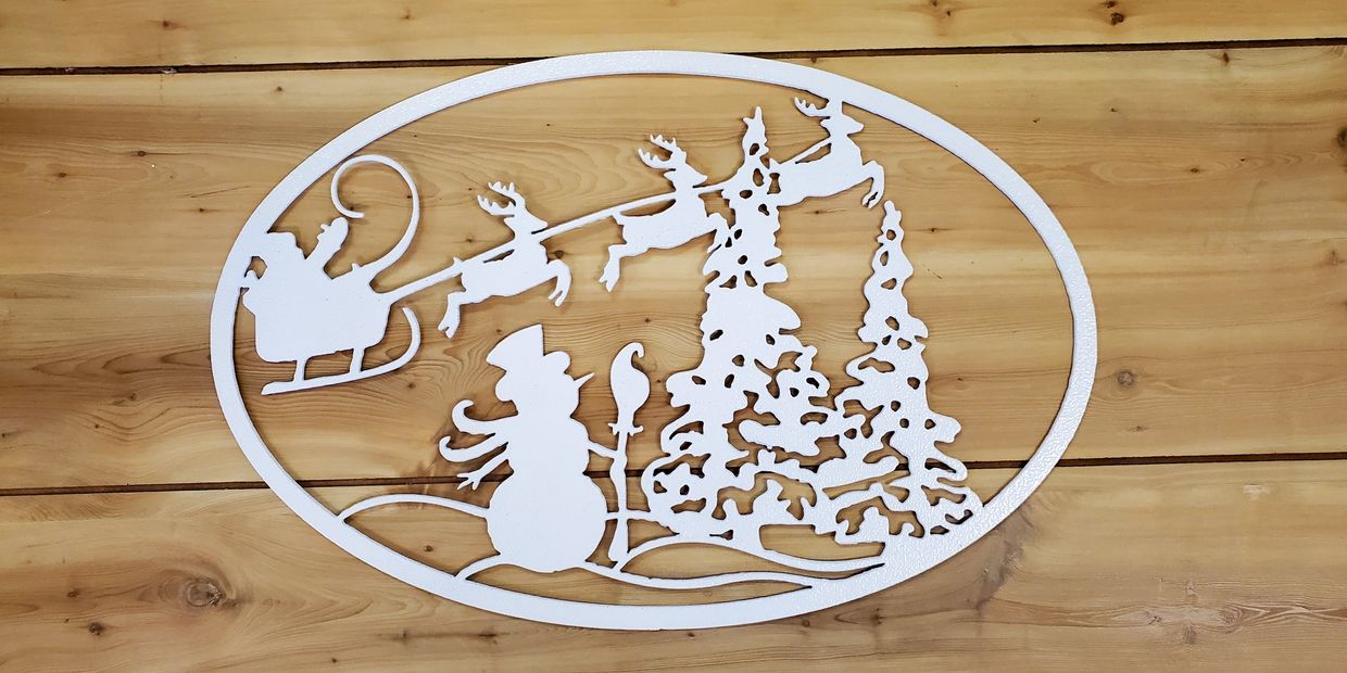Custom metal Christmas signs by the Koi Lagoon in Fort Collins