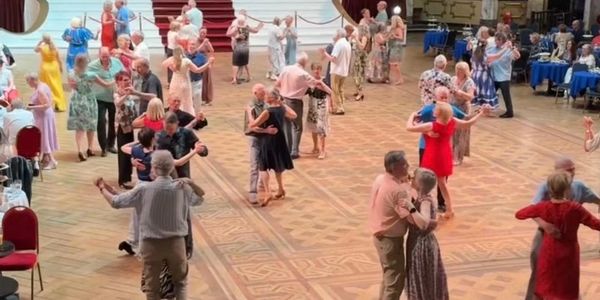 A group of social dancers in The Blackpool Tower Ballroom