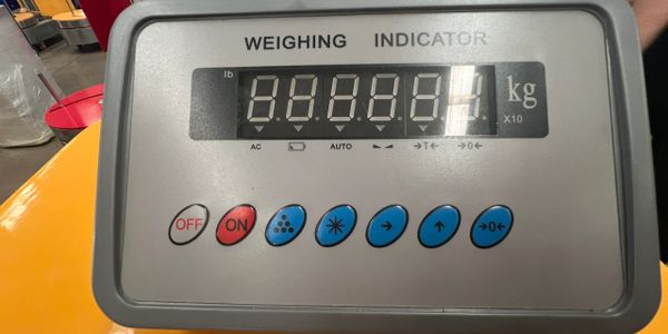 weighing scale part of luggage wrapping machine