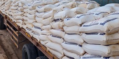 Sacks stacked on a truck bed.