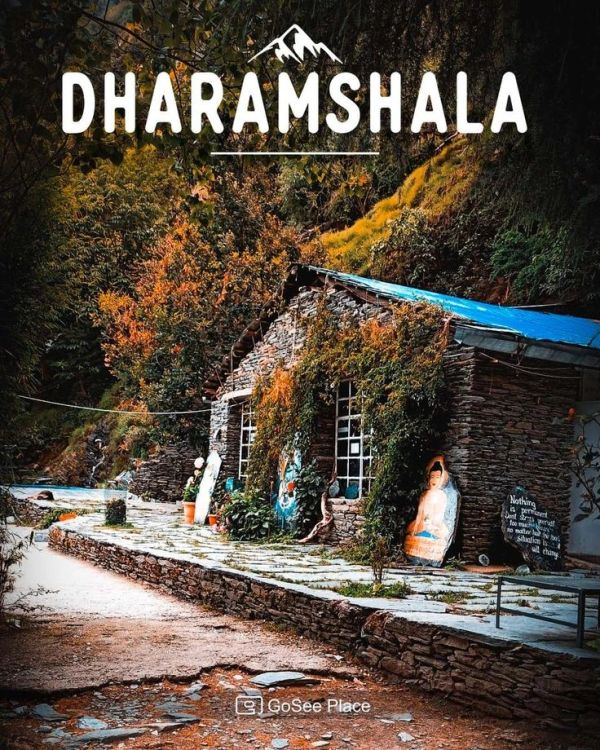 Stone house in Dharamshala with autumn foliage.