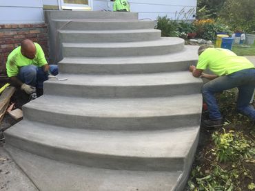residential steps - concrete dual access curved broom finish entryway steps (view 2) 