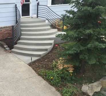 residential steps - concrete dual access curved broom finish entryway steps (view 3) 