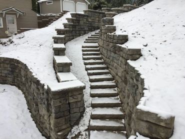 residential steps - precast concrete redi-rock steps and retaining wall