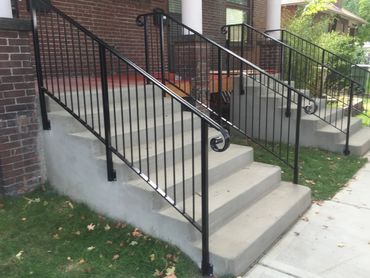 residential steps - concrete broom finish with metal railing (view 1)