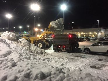 commercial excavation - snow removal and hauling with wheel loader and dump truck