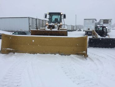 commercial excavation - snow plowing with loader and skid steer