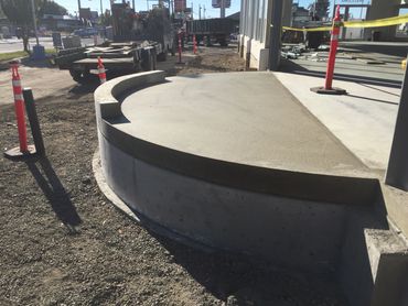 commercial walls - curved curb wall