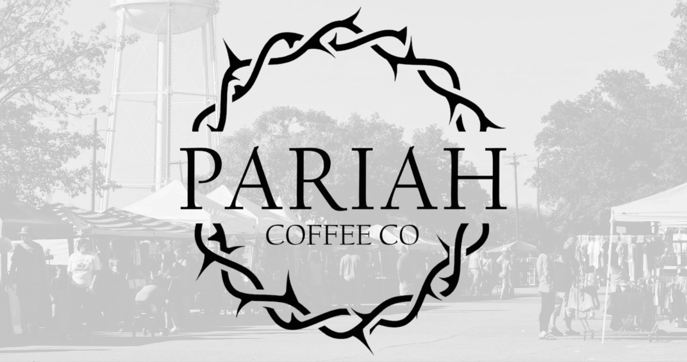 Outdoor market with Pariah Coffee Co. logo overlay.