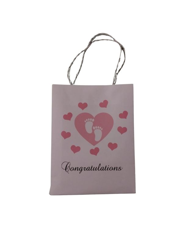 Gift bag with heart and baby footprints design.