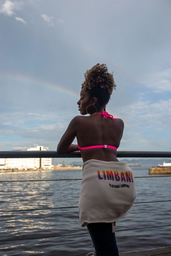 A girl wears a crop top hoodie