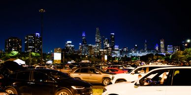 Parked cars at a CHI-Together drive-in event at Soldier Field.