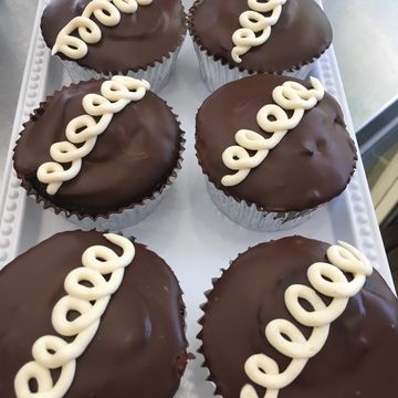 vegan chocolate cupcake with cream filling and chocolate glaze