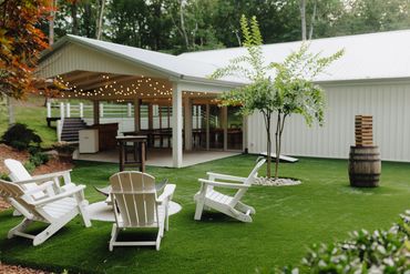 Sit cozily by the fire pit with your guests on wedding day at the chapel wedding venue in Dickson.