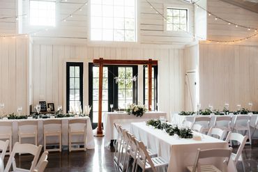 Wedding reception in private barn wedding venue in the Tennessee countryside.