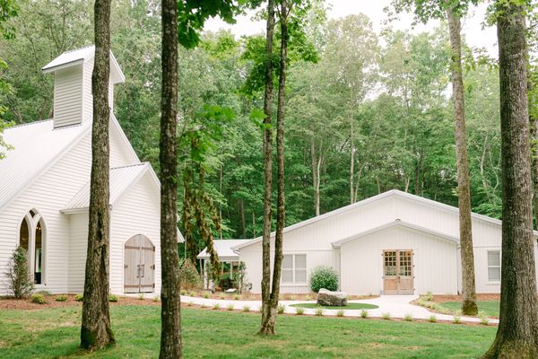 A white chapel wedding venue at Firefly Lane Weddings in the TN hillside. Nashville Wedding Venue.