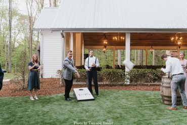 Play a game of cornhole with your guests at Firefly Lane Weddings in the courtyard.