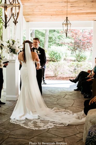 Bride and groom getting married at their ceremony at Firefly Lane Weddings Chapel venue.