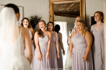 Bride first look with bridesmaids in the Bridal Suite at Firefly Lane.