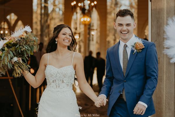 Firefly Lane Weddings bride and groom walking down the aisle after their wedding ceremony at chapel.
