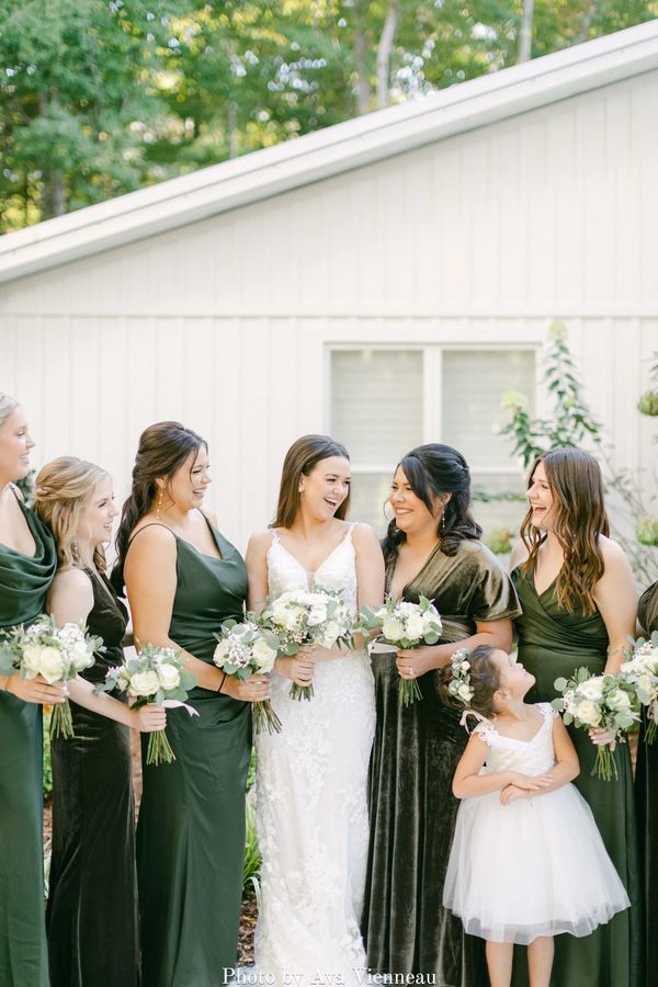 Green velvet and chiffon bridesmaids dresses at a Firefly Lane chapel wedding celebration.