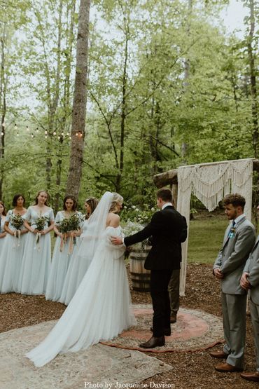 A boho wedding ceremony in The Enchanted Forest at Firefly Lane wedding venue in Nashville, TN