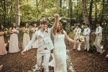 Bride and groom after saying their vows during their Enchanted Forest wedding ceremony.