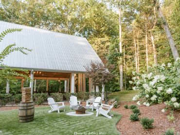 Fireside seating and lawn games at Firefly Lane Chapel in the Courtyard.