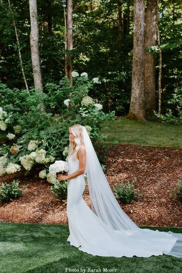 Bridal portraits at Firefly Lane chapel in the courtyard outside. Simple modern bridal gown.