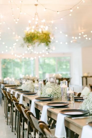 Black and white tablescapes and wedding decor at a Firefly Lane chapel wedding reception.