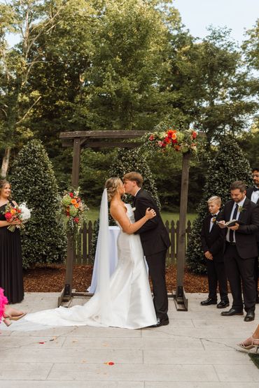 The Garden is an outdoor ceremony location at Firefly Lane's contemporary black barn venue in TN.