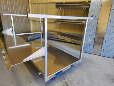 Gen 2 Skid on wheels in workshop.