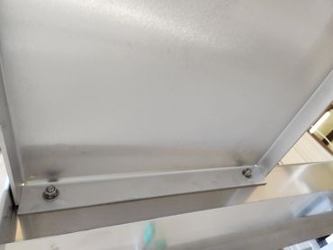 Close-up of a metal structure with bolts.