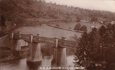 Historic black and white photo of G.W.R. Bridge in Bewdley crossing a river.