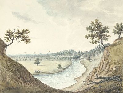 A serene river flowing through a valley with trees and hills.