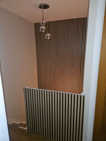 Bespoke timber slat wall panelling and feature wall installation in Sutton, Wallington and South London.