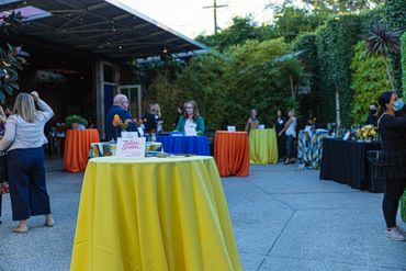 colorful table linen on cocktail tables - outdoor event overview